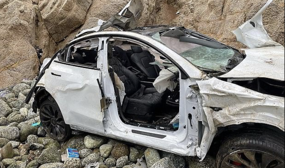 The Tesla vehicle that authorities say Dharmesh Patel intentionally drove off a California cliff (Bay Area Firefighters / Facebook)