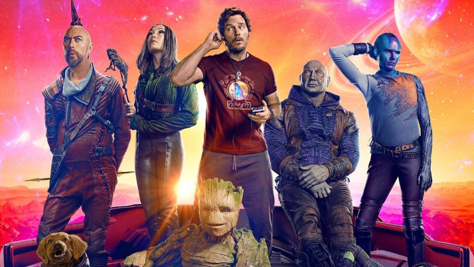 The Guardians of the Galaxy from Vol. 3 standing and sitting casually in a poster