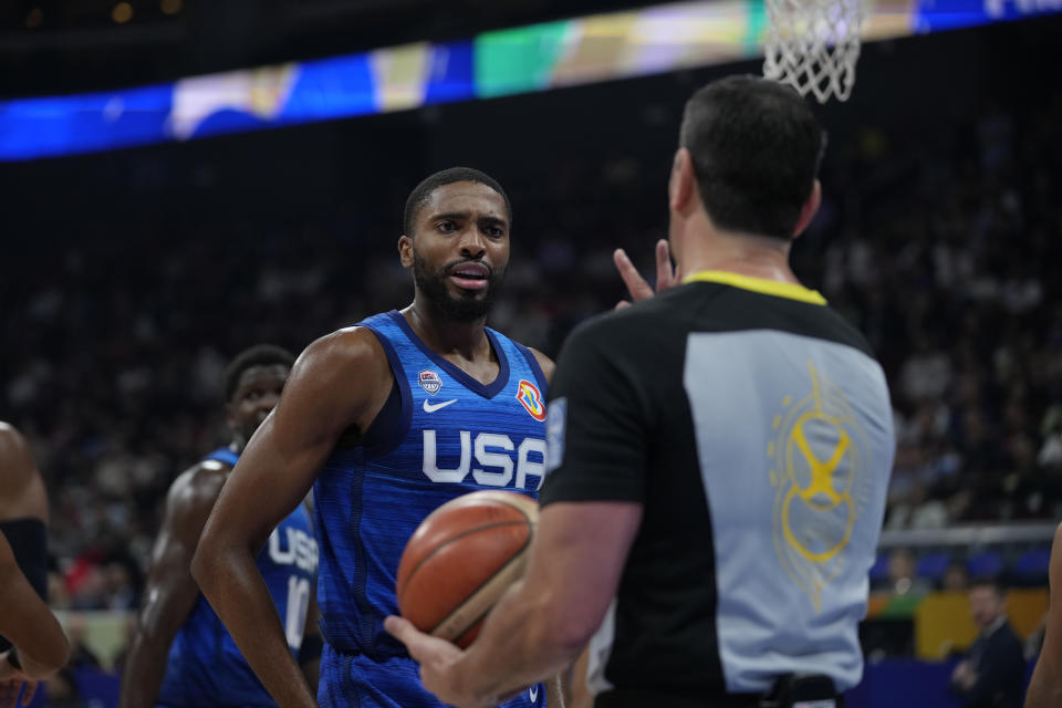 U.S. forward Mikal Bridges (5) reacts after being called for a foul by referee during the Basketball World Cup quarterfinal game between Italy and U.S. at the Mall of Asia Arena in Manila, Philippines, Tuesday Sept. 5, 2023. (AP Photo/Aaron Favila)