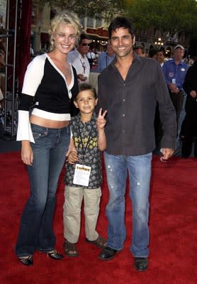 Rebecca Romijn Stamos and John Stamos at the LA premiere of Walt Disney's Pirates Of The Caribbean: The Curse of the Black Pearl