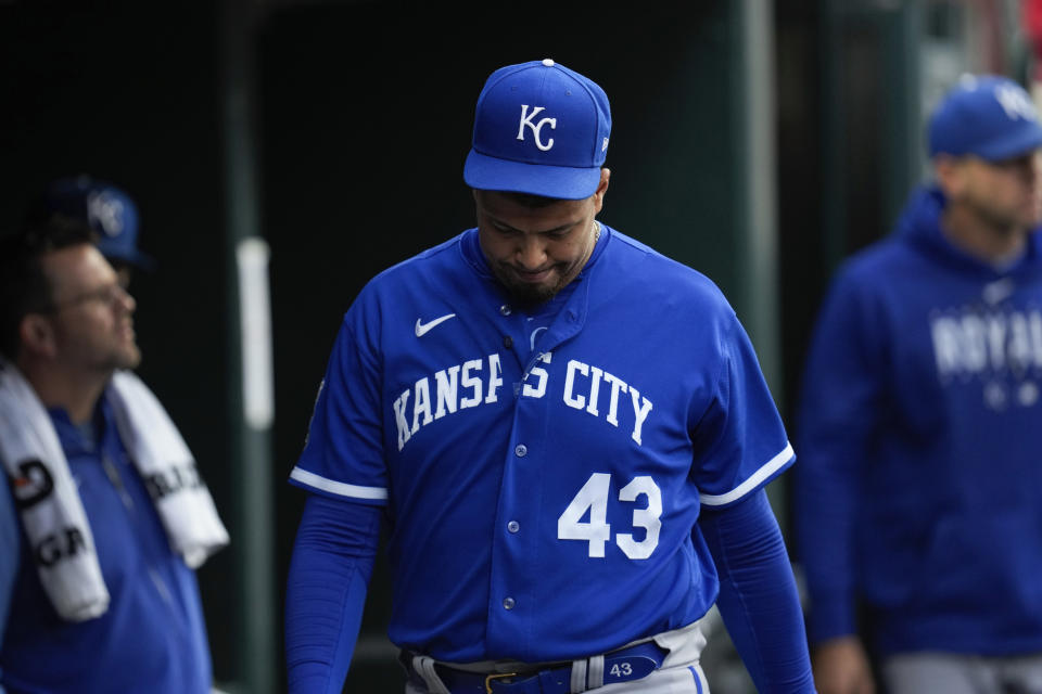 Kansas City Royals relief pitcher Carlos Hernandez (43) walks in the dugout after getting pulled against the Detroit Tigers in the seventh inning of a baseball game, Thursday, Sept. 28, 2023, in Detroit. (AP Photo/Paul Sancya)