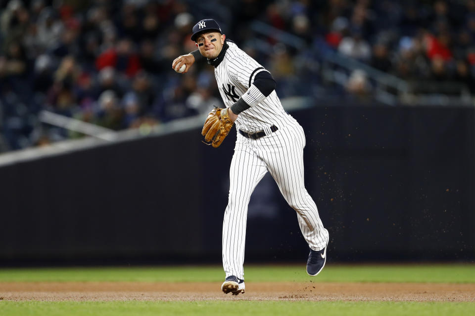 Apr 1, 2019; Bronx, NY, USA; New York Yankees shortstop Troy Tulowitzki (12) throws out Detroit Tigers left fielder Mikie Mahtook (8) during the seventh inning at Yankee Stadium. Mandatory Credit: Adam Hunger-USA TODAY Sports