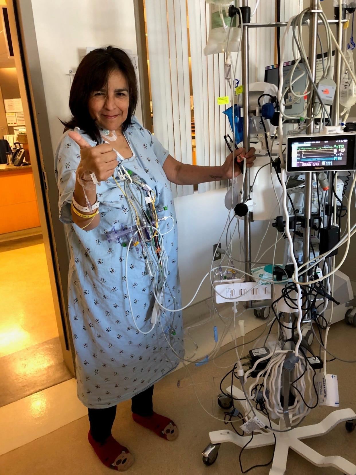 Ann Dudas in hospital standing up