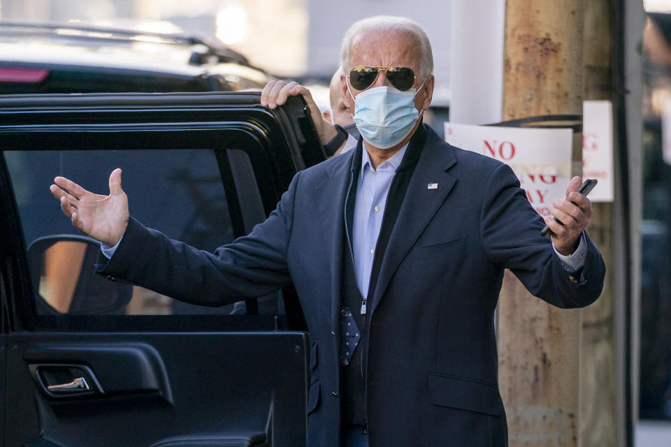 President-elect Joe Biden speaks to reporters as he leaves The Queen theater, Wednesday, Nov. 18, 2020, in Wilmington, Del. (AP Photo/Andrew Harnik)