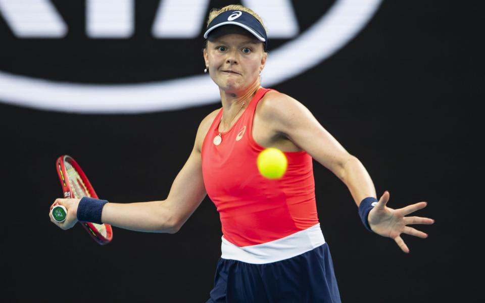 Harriet Dart of Great Britain hits a forehand in her second round match against Simona Halep of Romania on day four of the 2020 Australian Open at Melbourne Park - TPN/Getty Images