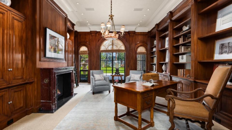 The wood-paneled library - Credit: Andrew Webb, Clarity NW Photography