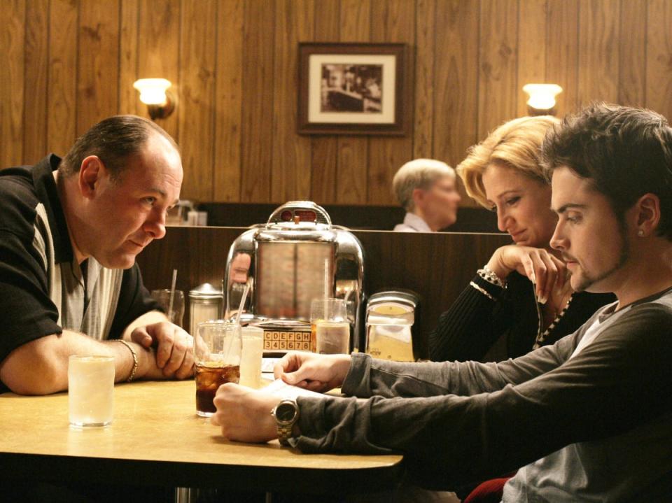 Don’t stop believing: Tony (James Gandolfini), Carmela (Edie Falco) and AJ (Robert Iler) enjoy a final family dinner (Rex, HBO)