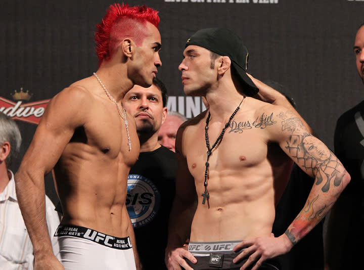 BELO HORIZONTE, BRAZIL - JUNE 22: (L-R) Opponents Godofredo Pepey and Rony "Jason" Mariano Bezerra face off after making weight during the UFC 147 weigh in at Estadio Jornalista Felipe Drummond on June 22, 2012 in Belo Horizonte, Brazil.