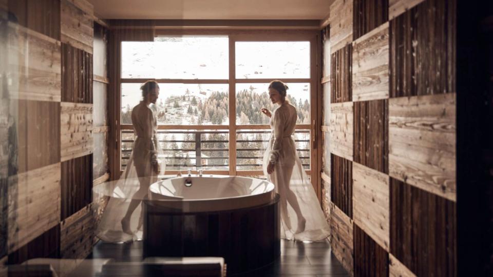 a bride and groom in a bathroom