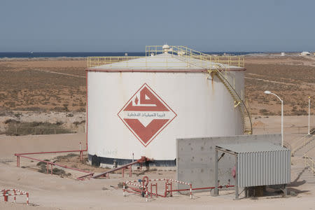 FILE PHOTO: An oil tank is seen inside Ras Lanuf port Oil and Gas Company in Ras Lanuf, Libya July 10, 2018. REUTERS/Esam Omran Al-Fetori