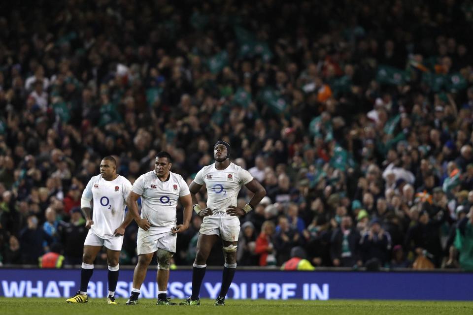 Kyle Sinckler, Mako Vunipola and Maro Itoje look on dejected after defeat by Ireland: AFP/Getty Images