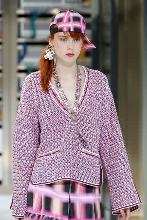 A model presents a creation by German designer Karl Lagerfeld as part of his Spring/Summer 2017 women's ready-to-wear collection for fashion house Chanel. REUTERS/Charles Platiau