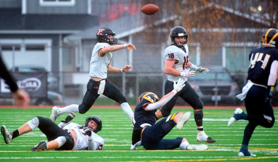 Kennewick quarterback Dayton Davis delivers a pass during Saturday afternoon’s 3A football state championship game against the Bellevue Wolverines at Sparks Stadium in Puyallup, Washington, on Dec. 4, 2021. Bellevue won the title, 17-13.