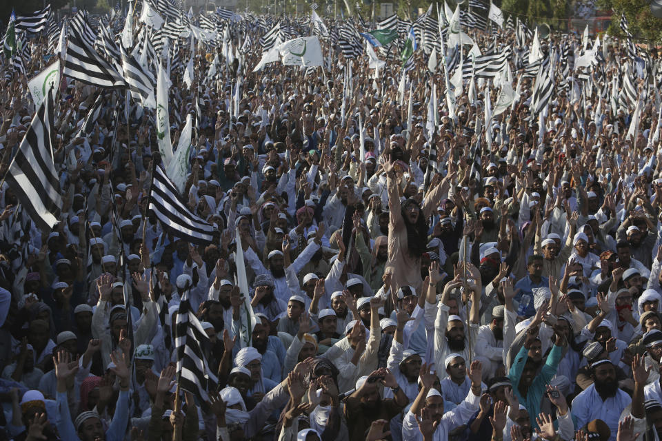 Supporters of Pakistani religious parties coalition Muttahida Majlis-e-Amal Alliance rally against the acquittal of Pakistani Christian woman Asia Bibi, in Karachi, Pakistan, Thursday, Nov. 8, 2018. A Christian woman acquitted after eight years on death row in Pakistan for blasphemy was released but her whereabouts in Islamabad on Thursday remained a closely guarded secret in the wake of demands by radical Islamists that she be publicly executed. (AP Photo/Fareed Khan)