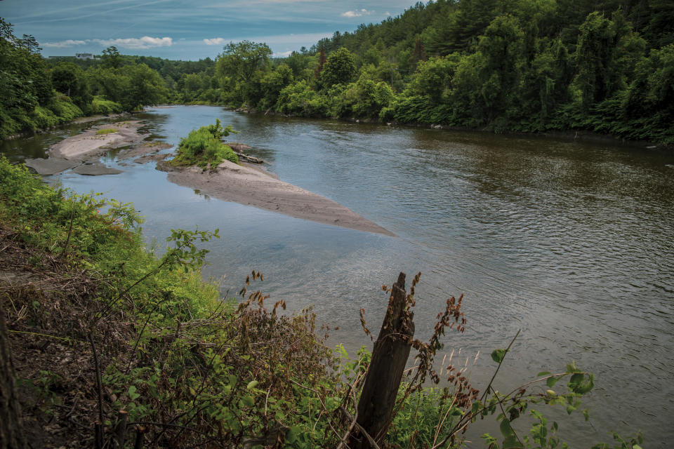 A view of the Winooski River that flooded the state's capital of Montpelier, Vermont in 2023, in this July 3, 2024 image. A year after catastrophic flooding inundated parts of Vermont, some homeowners are still in the throes of recovery. (AP Photo/ Dmitry Belyakov)