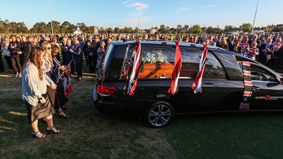 The Hearse carrying the coffin of Danny Frawley, pictured here during his farewell lap of honour.