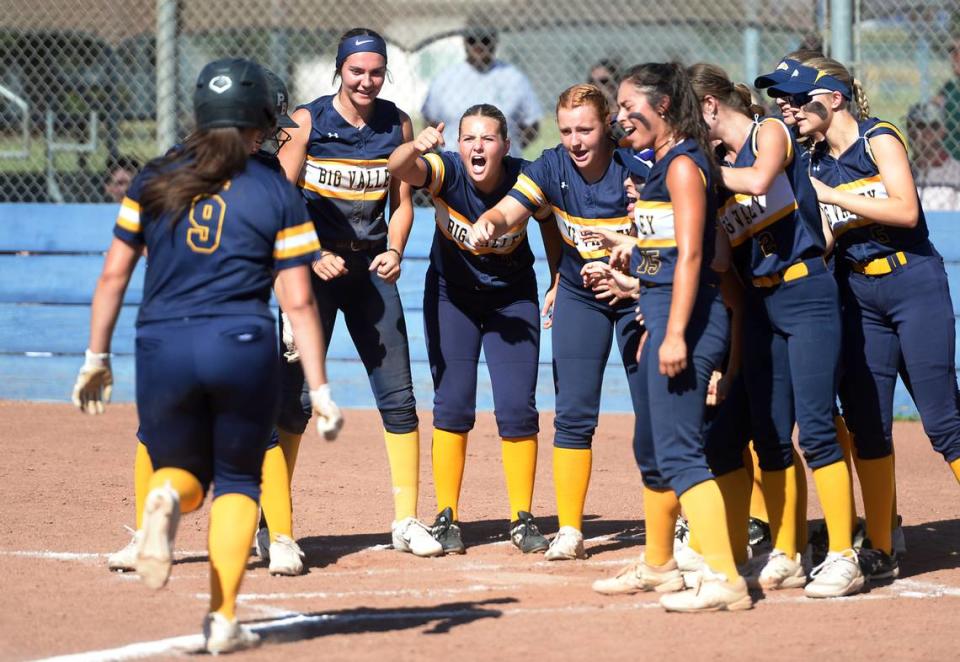 Big Valley Christian players greet Kailey Rivera after hitting a home run against Leigh High School of San Jose during the CIF Northern California Division V Regional Playoffs at Big Valley Christian High School in Modesto, Calif. on Thursday, May 30, 2024.