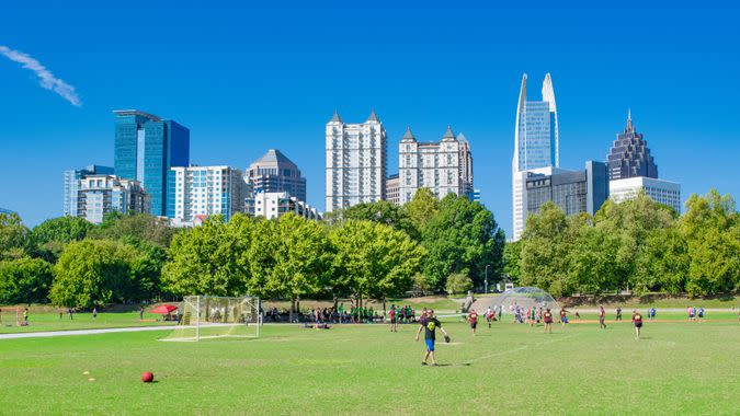 Atlanta, Georgia, USA - September 25, 2016: Residents of Atlanta enjoy a morning of softball and kickball in Piedmont Park.