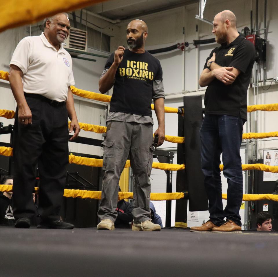ICOR Boxing co-owner Clif Johnson introduces referee Francis Sargent to the crowd.