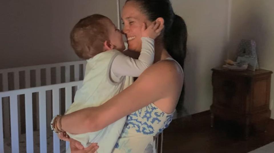 Meghan Markle holds baby Archie in his nursery.