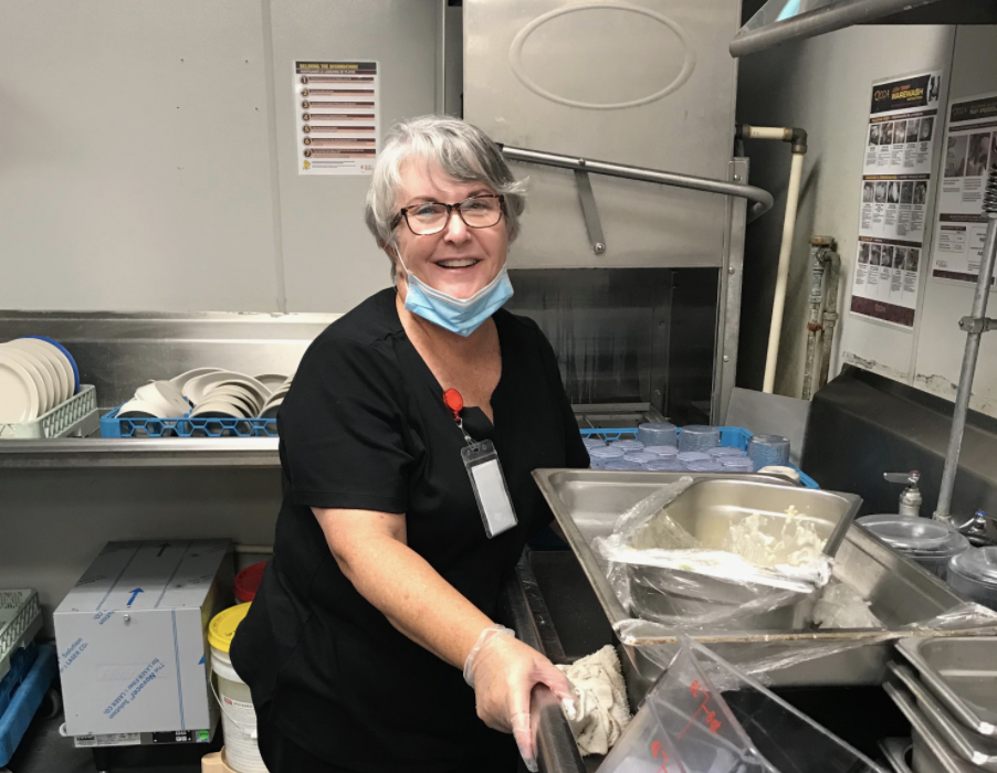 Mary Daniel took a job as a dishwasher in the kitchen at her husband's Florida assisted living facility in order to see him throughout the coronavirus pandemic. (Photo: Mary Daniel)