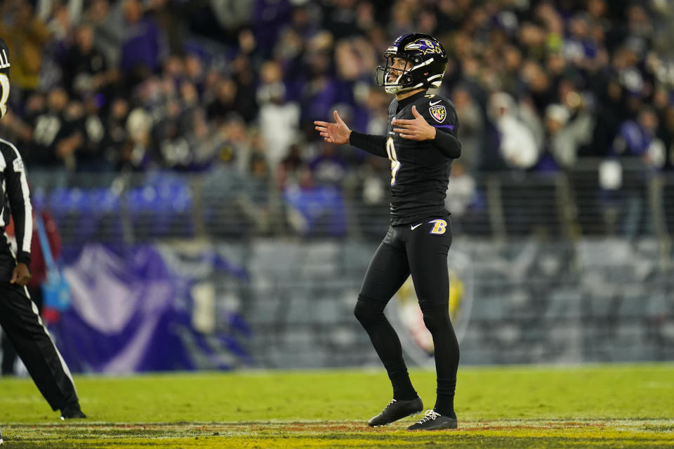 Baltimore Ravens' Justin Tucker reacts after kicking a field goal during the second half of an NFL football game against the Cincinnati Bengals, Sunday, Oct. 9, 2022, in Baltimore. (AP Photo/Julio Cortez)