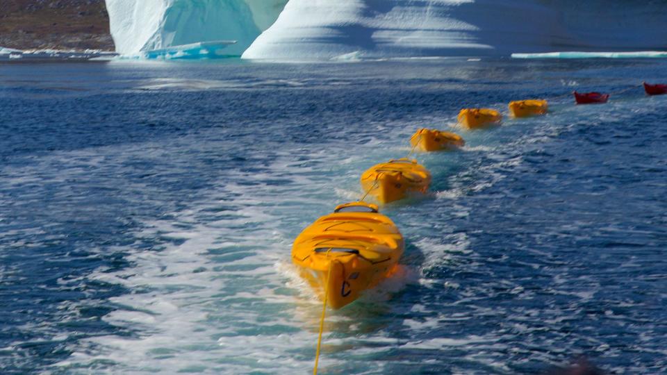 kayak excursion during luxury expedition ship seabourn venture's greenland cruise