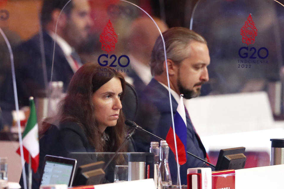 Russian Director of the Financial Stability Department of the Bank of Russia Elizaveta Danilova, left, and Russian Deputy Finance Minister Timur Maksimov, right, attend the G20 Finance Ministers and Central Bank Governors Meeting in Nusa Dua, Bali, Indonesia, Friday, July 15, 2022. Top financial officials from the Group of 20 leading rich and developing nations are gathering on the Indonesian island of Bali for meetings that begin Friday. (Made Nagi/Pool Photo via AP)