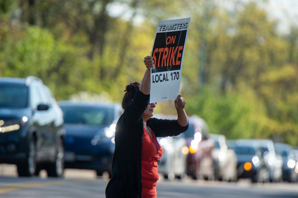 Picketing bus drivers on strike outside the Whitcomb Middle School in Marlborough, May 8, 2023.