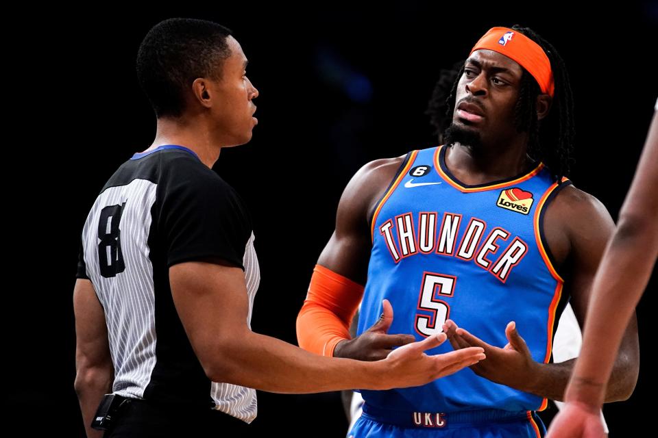 Thunder guard Luguentz Dort talks to a referee during a 145-135 win against the Knicks on Nov. 13 in New York.