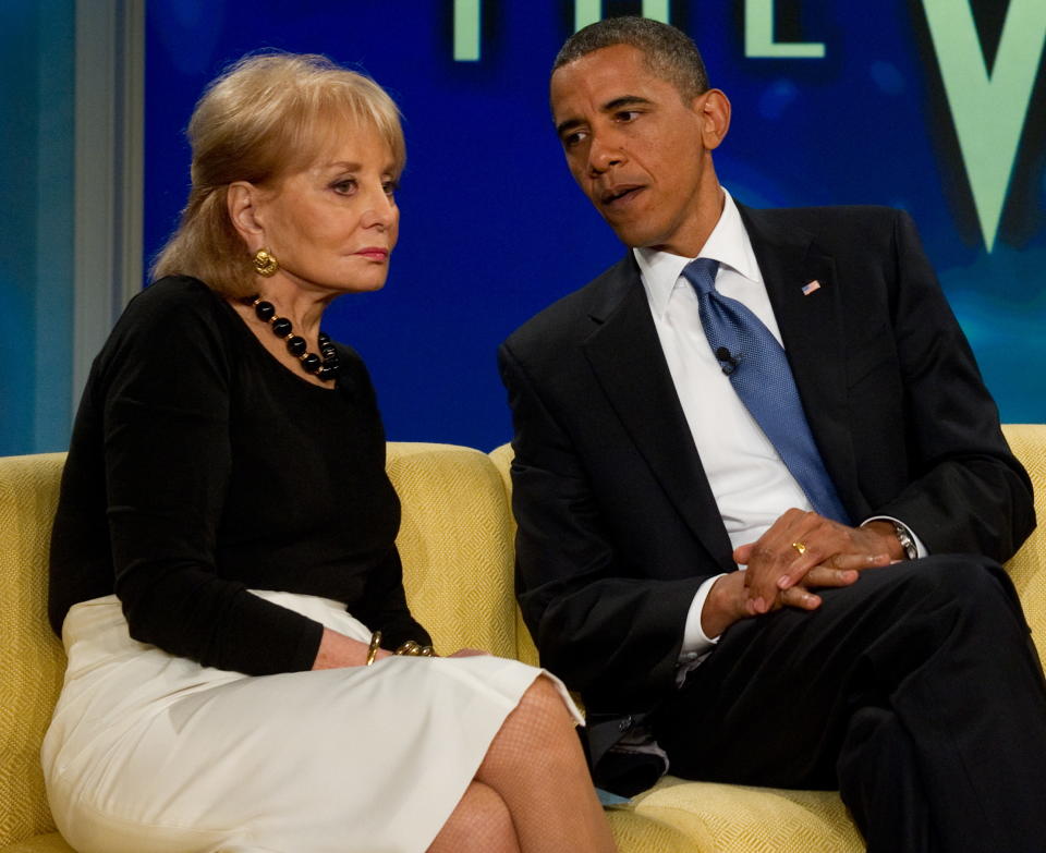 US President Barack Obama talks with Barbara Walters as he appears on the ABC daytime television talk show, 