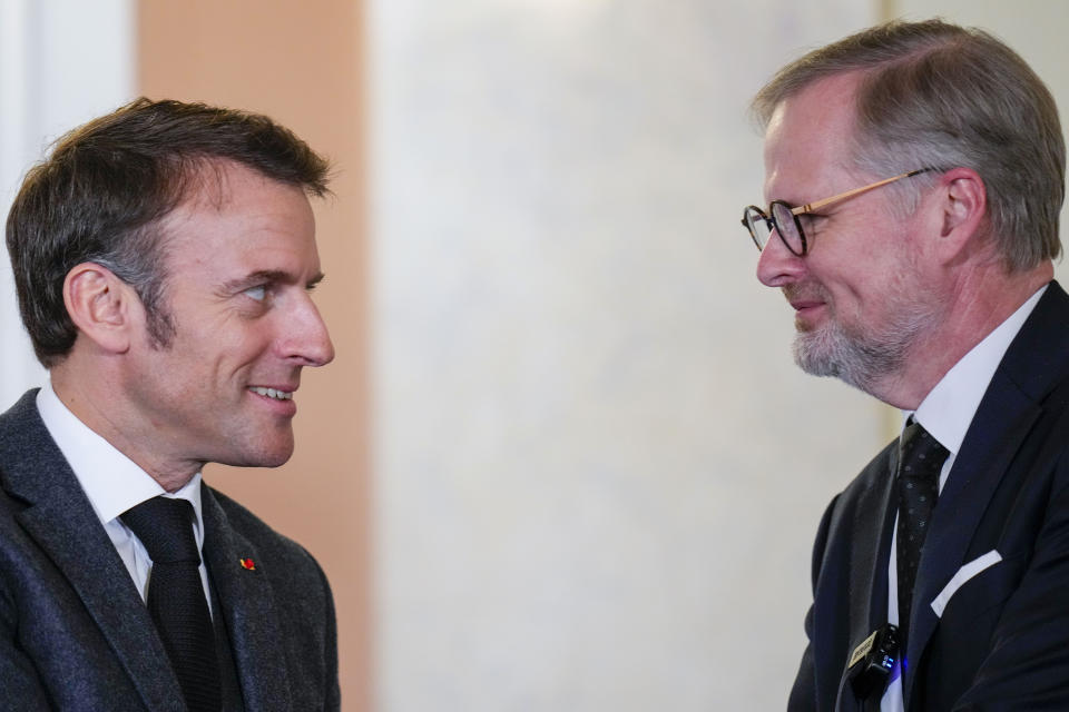 Czech Republic's Prime Minister Petr Fiala, right, speaks with French President Emmanuel Macron during a joint statement in Prague, Czech Republic, Tuesday, March 5, 2024. Macron is on a one-day official visit to Czech Republic. (AP Photo/Petr David Josek)