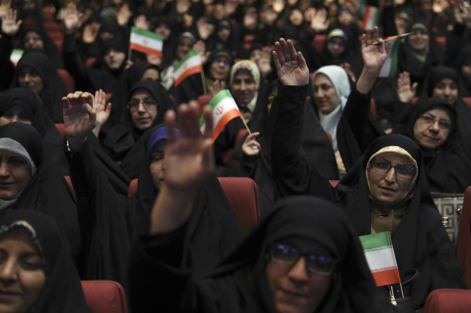 Female members of the the Basij paramilitary force affiliated to the Iran's Revolutionary Guard attend one of the ceremonies marking "Basij Week," and also commemorating the 40th anniversary of establishment of the force, in Tehran, Iran, Sunday, Nov. 24, 2019. (AP Photo/Vahid Salemi)