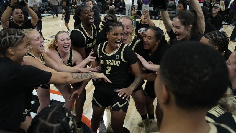 Colorado players celebrate after defeating LSU in a game Monday, Nov. 6, 2023, in Las Vegas. LSU is the defending national champion.