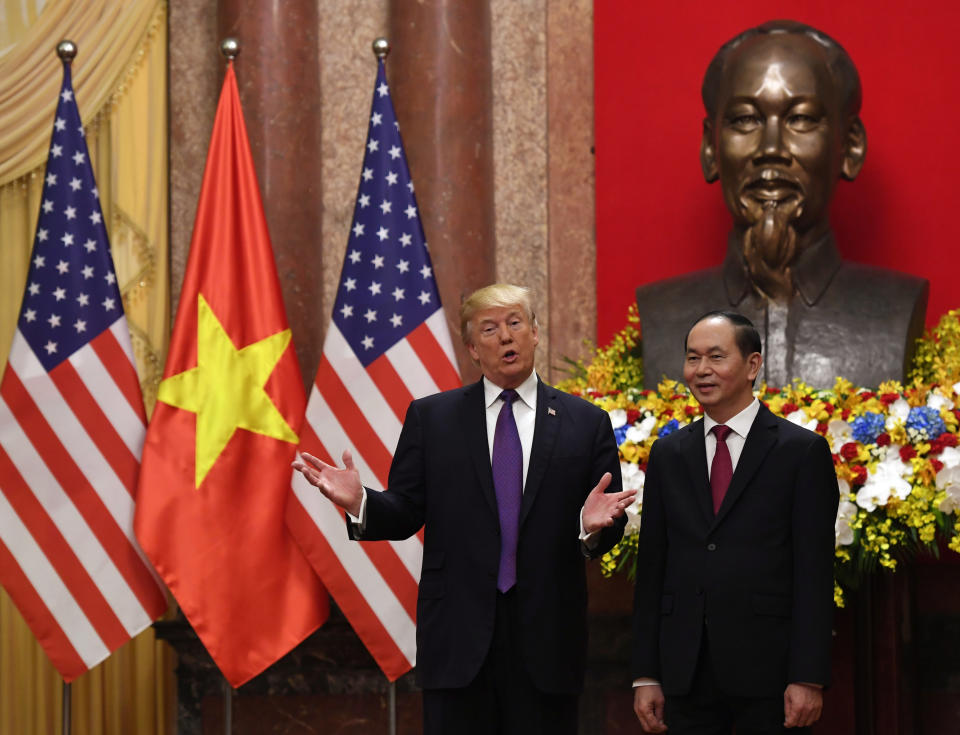 U.S. President Donald Trump poses with Vietnamese&nbsp;President Trần Đại Quang during a welcoming ceremony at the Presidential Palace in Hanoi on Nov. 12, 2017. (Photo: Hoang Dinh Nam / Pool / Reuters)