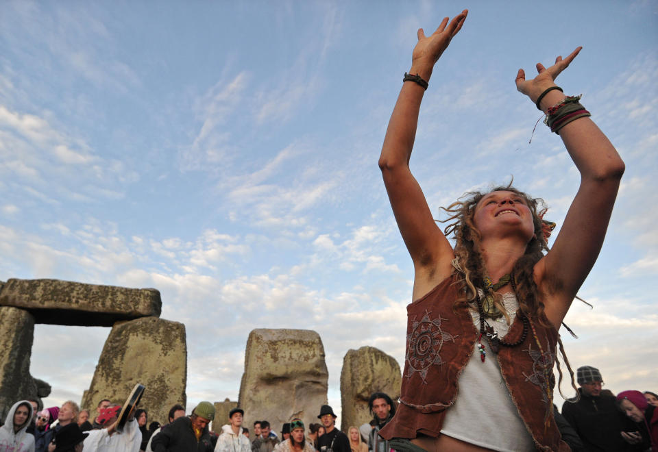 Revelers celebrate the pagan festival of 'Summer Solstice' at Stonehenge in Wiltshire in southern England, on June 21, 2010. (Carl Court/AFP/Getty Images)