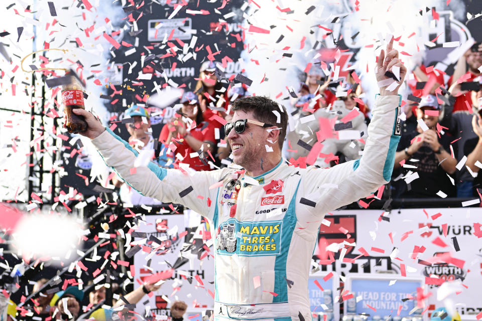 Denny Hamlin celebrates in Victory Lane after winning a NASCAR Cup Series auto race at Dover Motor Speedway, Sunday, April 28, 2024, in Dover, Del. (AP Photo/Derik Hamilton)