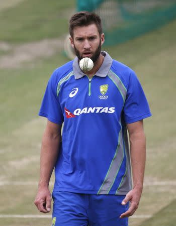 FILE PHOTO: Cricket - World Twenty20 cricket tournament practice session - Dharamsala, India, 17/03/2016. AustraliaÄôs Andrew Tye prepares to bowl. REUTERS/Adnan Abidi