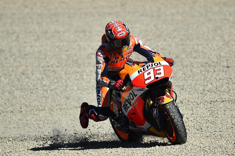 Spain's rider Marc Marquez competes on his Repsol Honda during the MotoGP Free Practice session of the Italy's MotoGP Grand Prix on May 29, 2015 on the Mugello 's racetrack