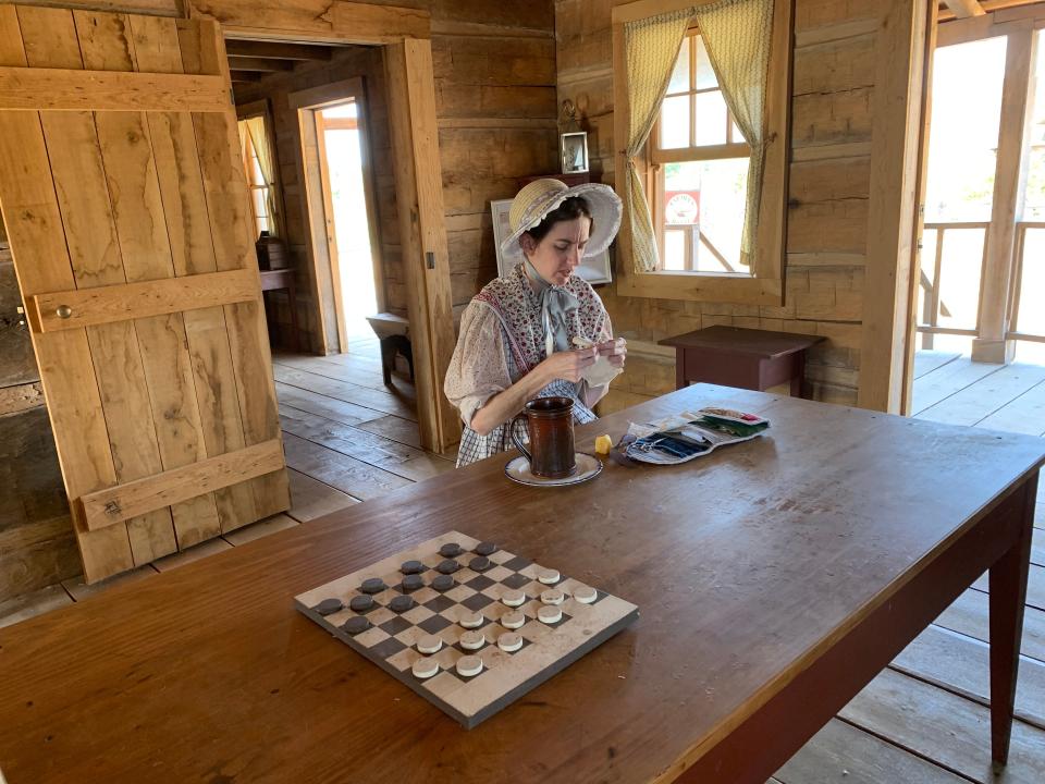 Employees and volunteers at San Felipe de Austin reenact life in the frontier town, which residents set on fire in 1836 as Mexican troops approached.