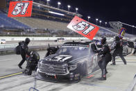 Kyle Busch (51) makes a pit stop during a NASCAR Truck Series auto race Saturday, June 13, 2020, in Homestead, Fla. (AP Photo/Wilfredo Lee)