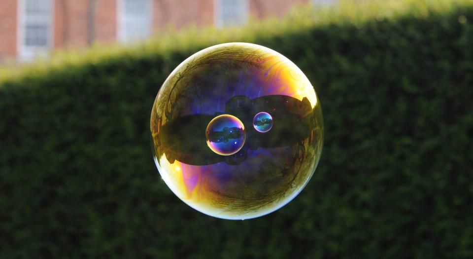 Richard, 39, has captured the exact moment a bubble bursts as well as snapping bubbles within other bubbles.