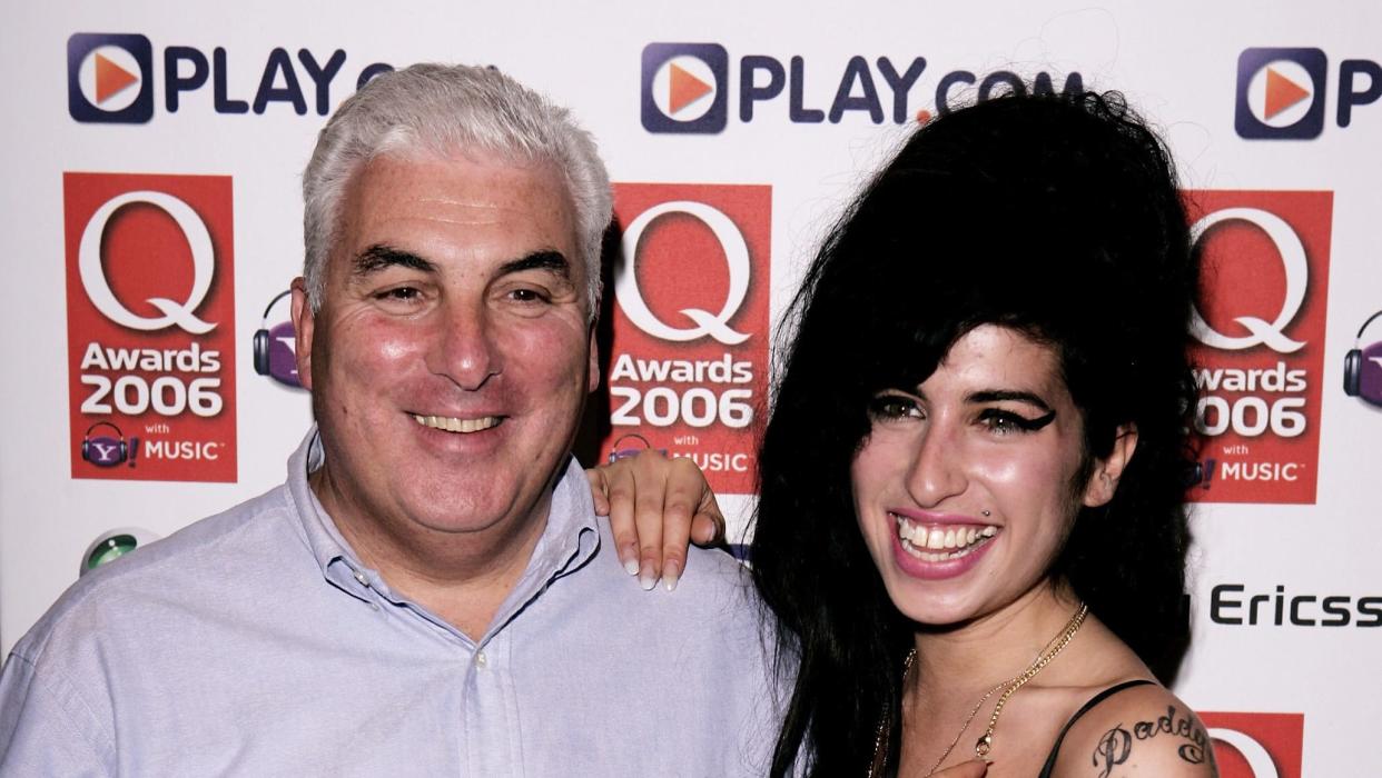 LONDON - OCTOBER 30: Singer Amy Winehouse and her father Mitch pose in the awards room at the Q Awards 2006 at Grosvenor House Hotel on October 30, 2006 in London, England. (Photo by Dave Hogan/Getty Images)