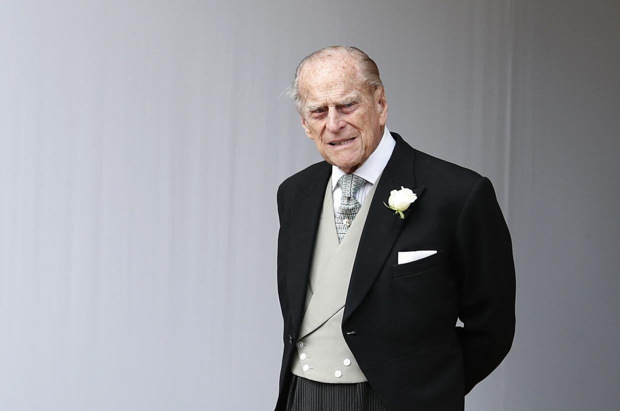 Britain's Prince Philip waits for the bridal procession following the wedding of Princess Eugenie of York and Jack Brooksbank at St George's Chapel in Windsor Castle, England on Oct. 12, 2018. 