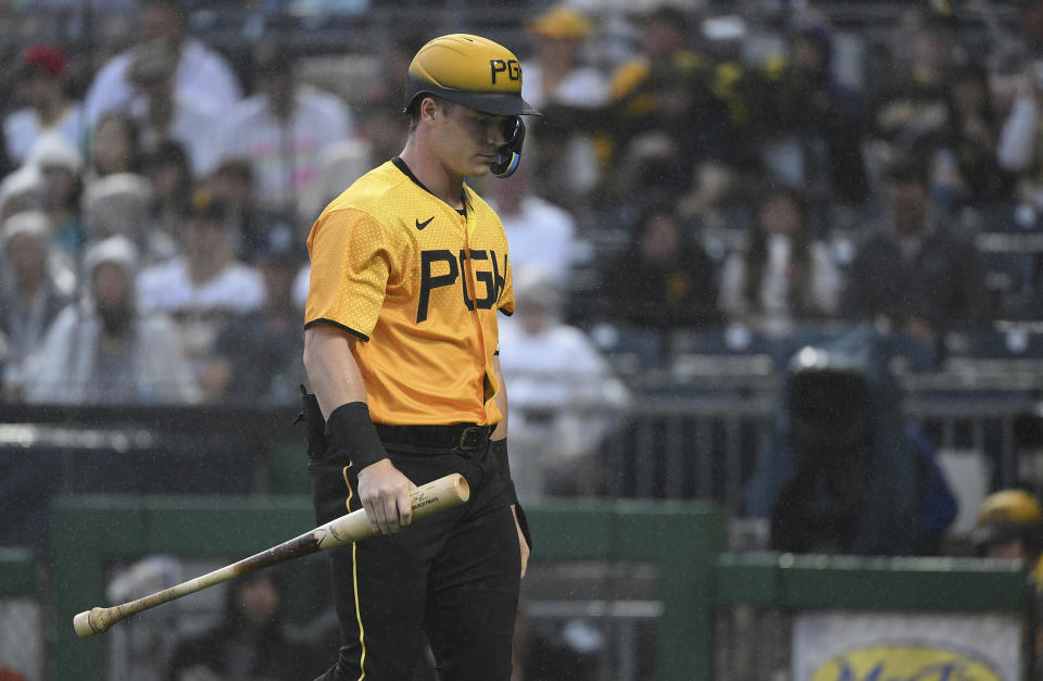 Pittsburgh Pirates' Henry Davis walks back to the dugout after striking out during the first inning of the team's baseball game against the San Diego Padres, Tuesday, June 27, 2023, in Pittsburgh. (AP Photo/Justin Berl)