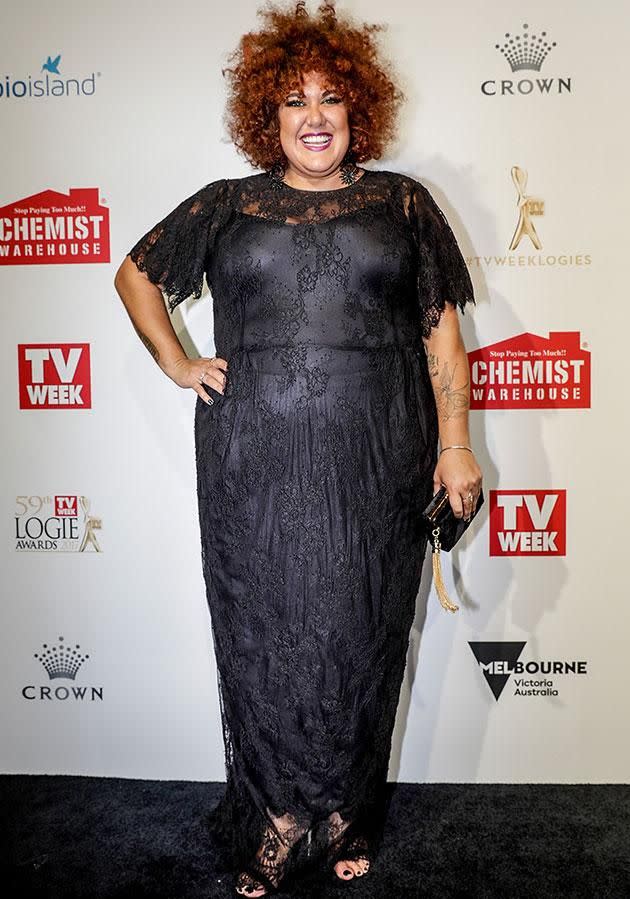 Casey rocked a black lace frock. Photo: Getty