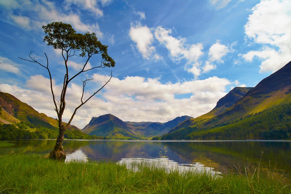 Buttermere is 2km long and surrounded by fells (Getty Images)