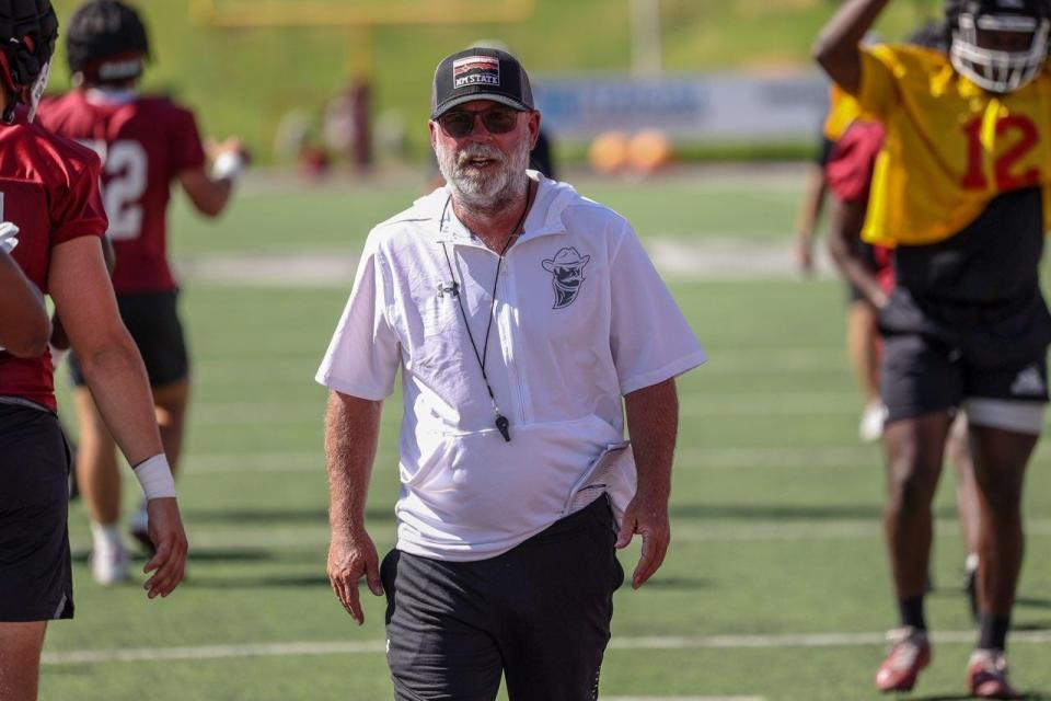 New Mexico State football coach Jerry Kill runs football practice at Aggie Memorial Stadium.