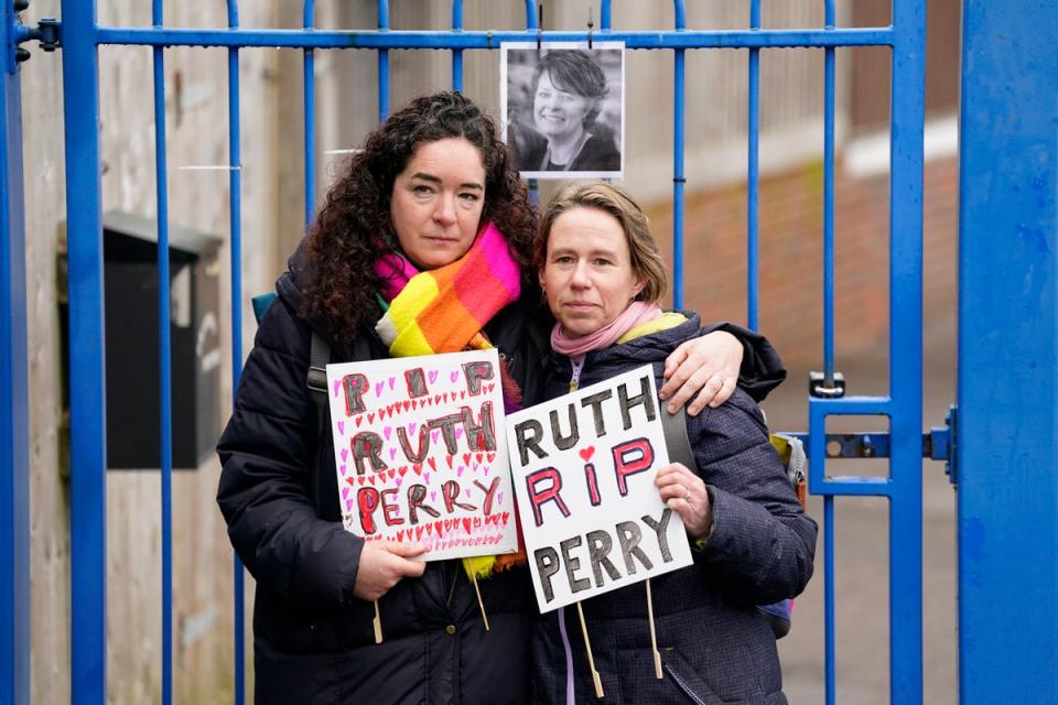 Ellen and Liz  outside the gates to John Rankin Schools in Newbury, Berkshire (PA)