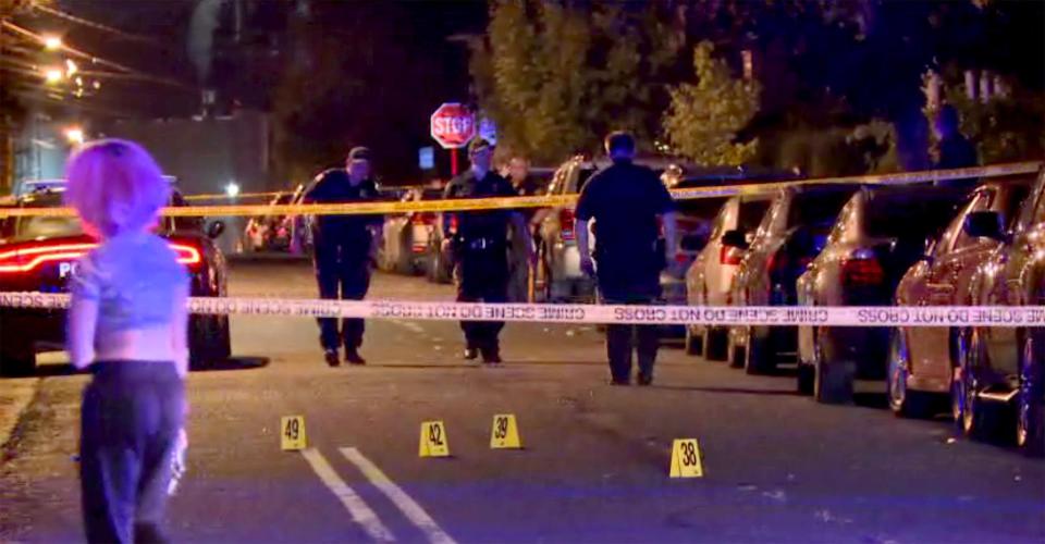 Police continue to gather evidence along Delafield Street in New Brunswick early Sunday, September 13, 2020, where two men were killed and six other people were injured after a shooting.